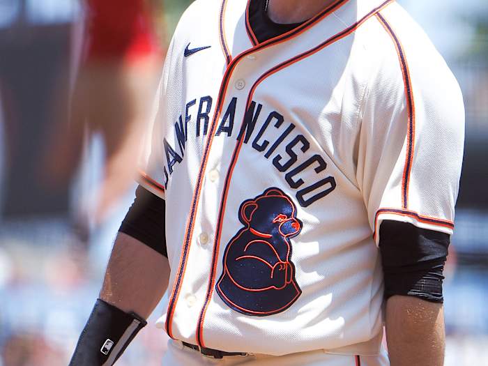 Former SF Giants first baseman Brandon Belt wears the jersey of the San Francisco Sea Lions in 2021.